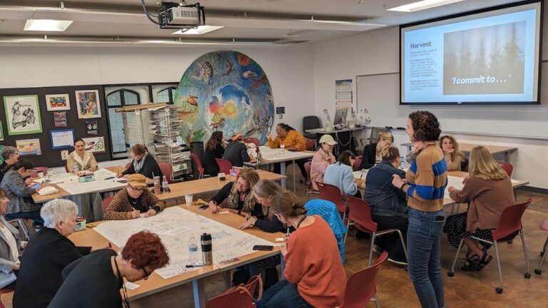 People work in a classroom